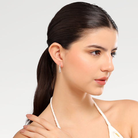 Isha Sterling Silver Oval Huggies Earrings