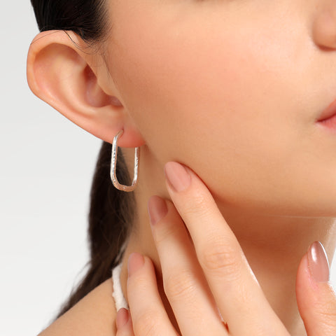 Isha Sterling Silver Oval Huggies Earrings