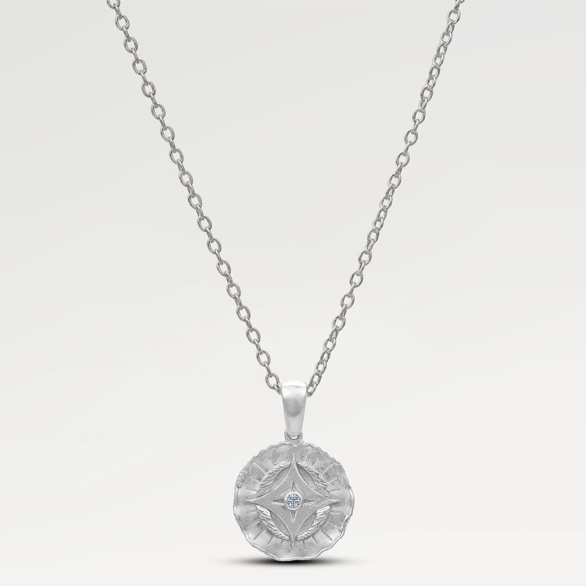 Plated Round Embosed Bazel Pendants with  Round Cut White Cubic Zirconia