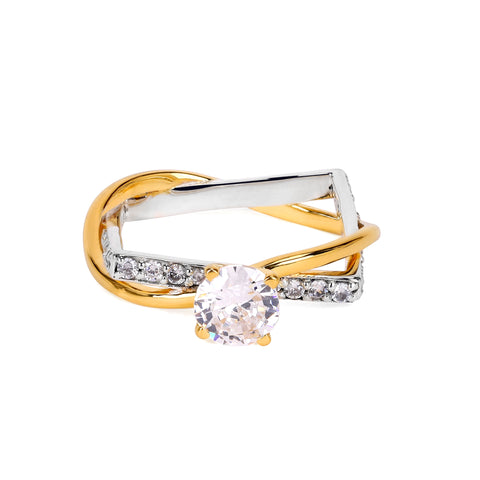 Two-tone gold and silver ring with a central gemstone on a white background